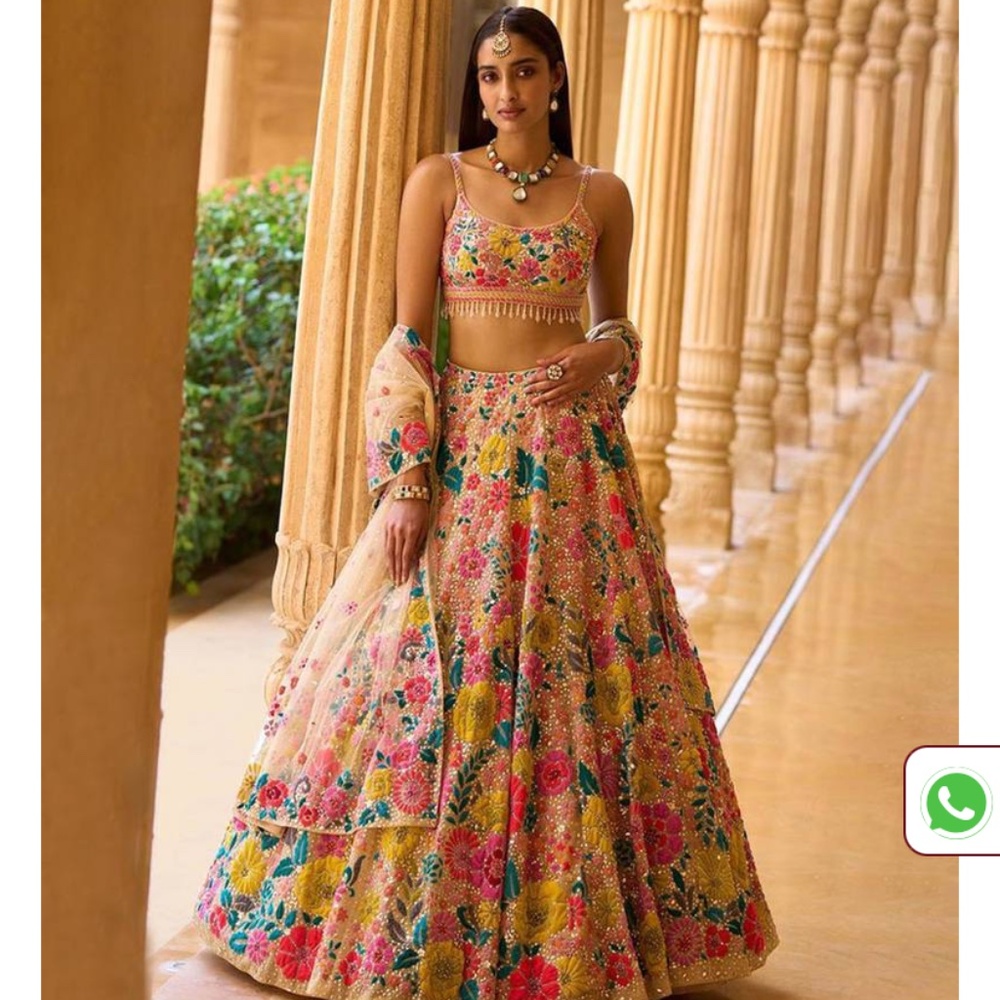 Gold and floral lenhenga for Indian wedding guest dress